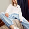 Herren-Pullover von Fila x Pepe Shimada im Crossover-Cartoon-Print mit Rundhalsausschnitt, weiß