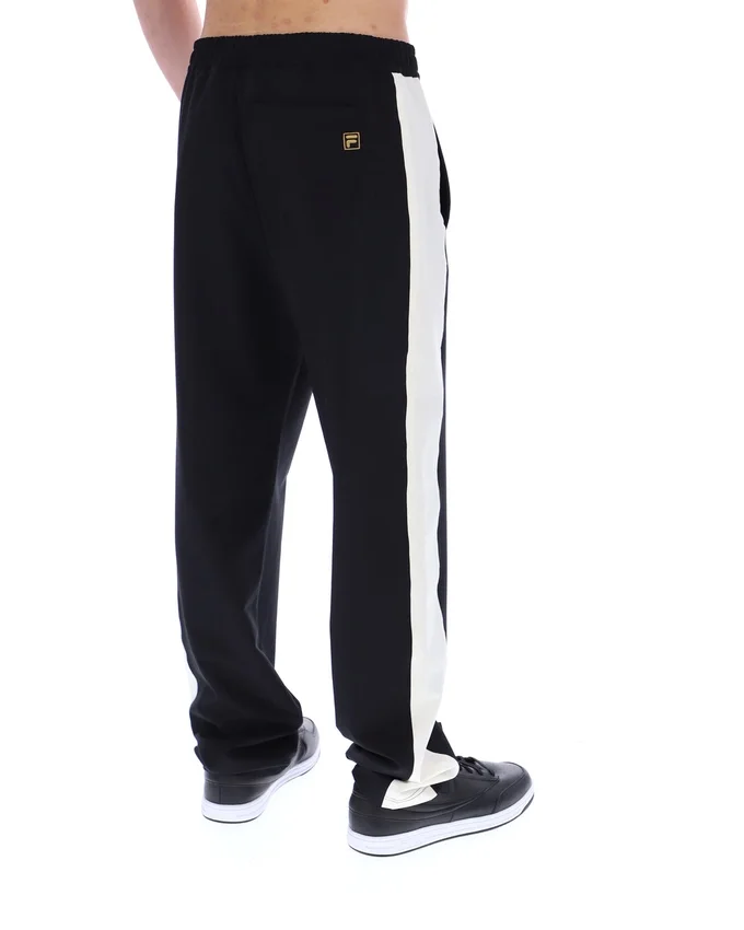 Schwarze, vom Ali-Tennis inspirierte Hose