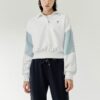 Sportlicher Pullover mit kontrastierenden Farben, Stehkragen und halbem Reißverschluss, weiß