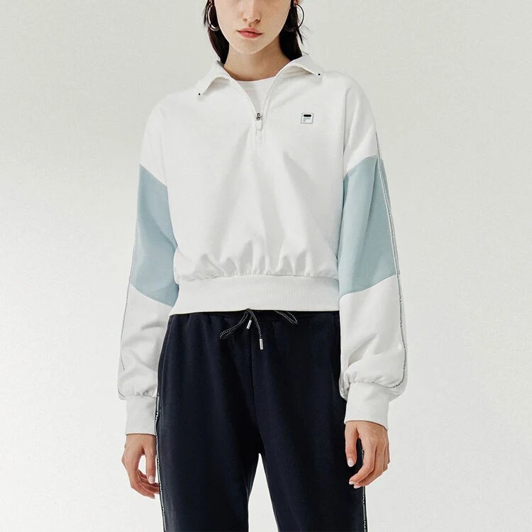 Sportlicher Pullover mit kontrastierenden Farben, Stehkragen und halbem Reißverschluss, weiß